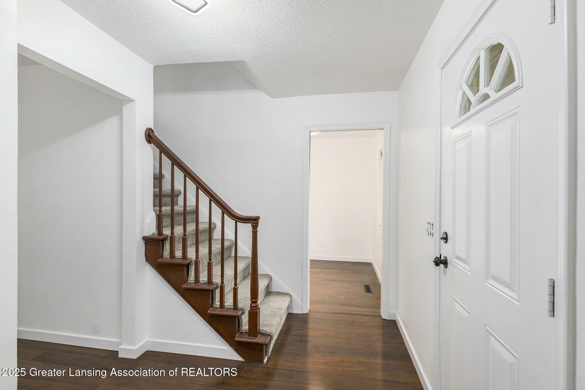 Property Photo: 1012 Grenoble Circle MI 48917