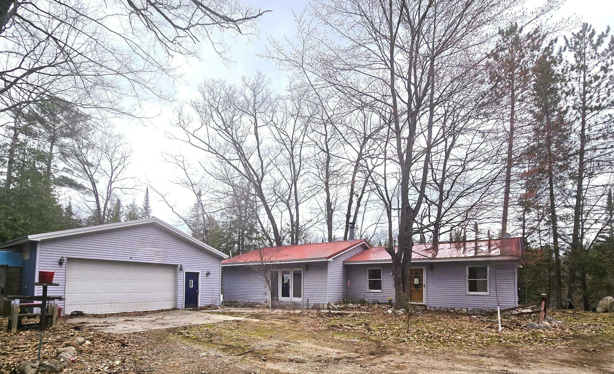 Property Photo: 8750 White Pine Pass SE MI 49633