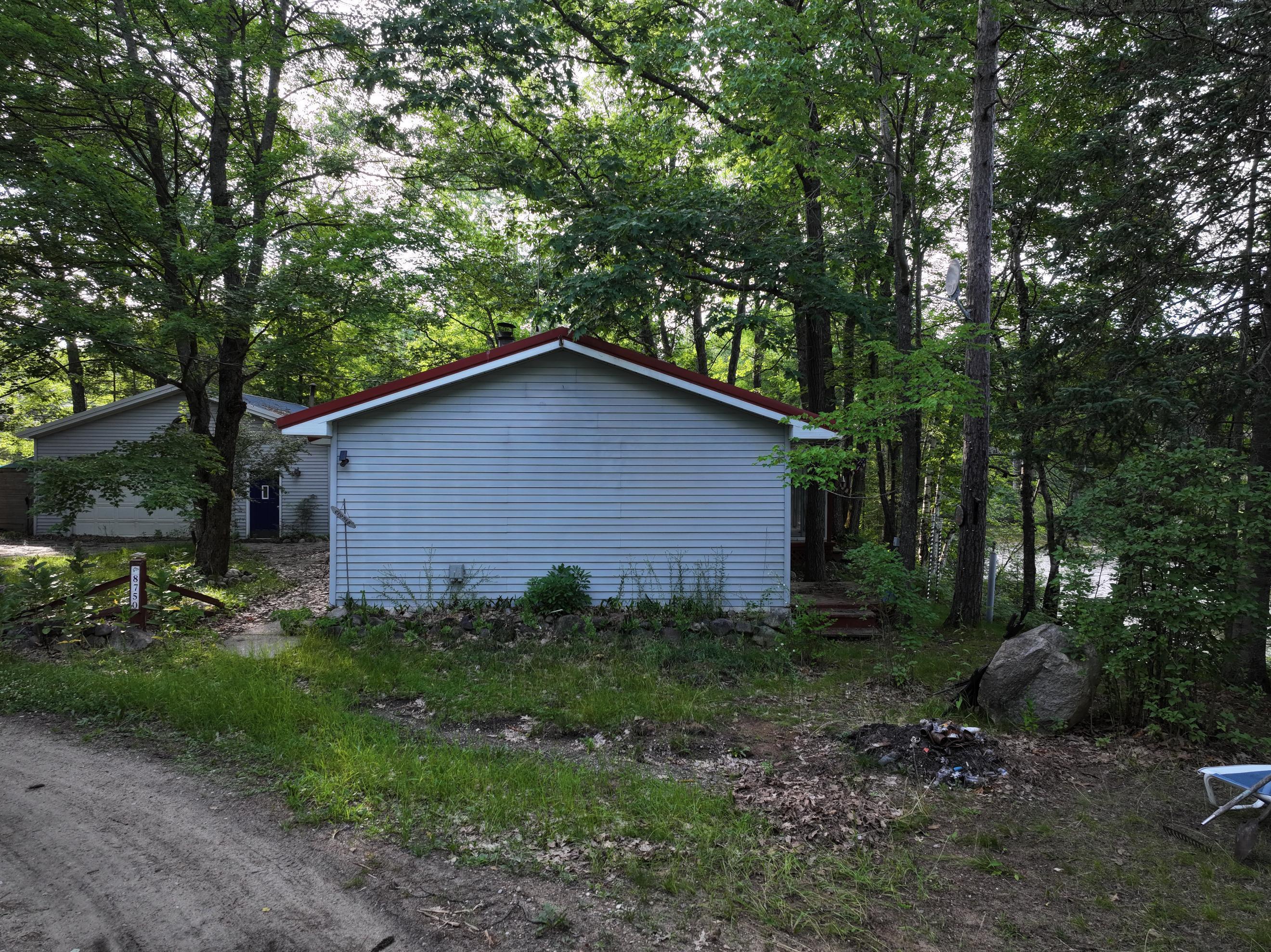 Property Photo: 8750 White Pine Pass SE MI 49633