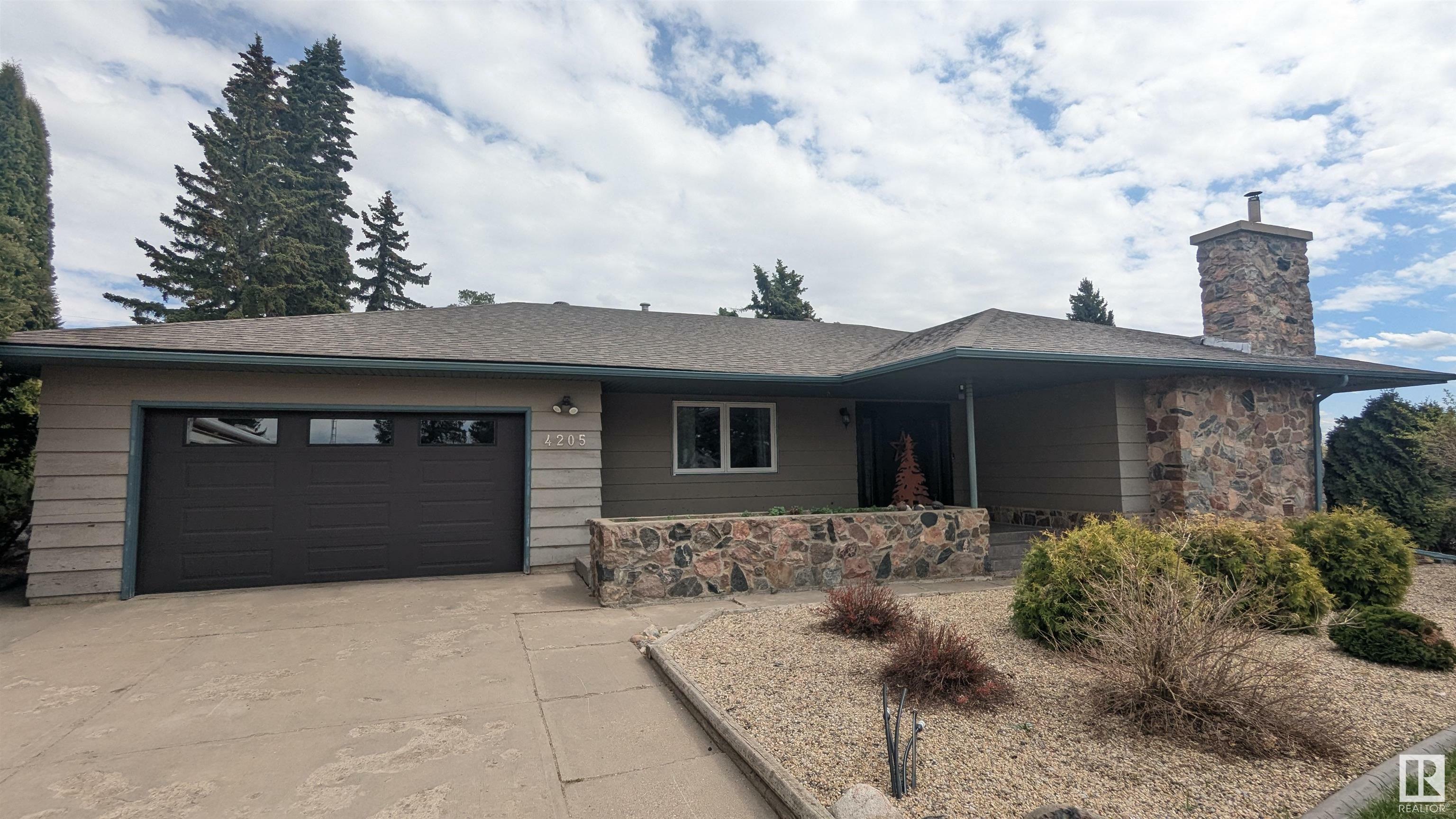 Property Photo: 4205 49A Street AB T9C 1B8