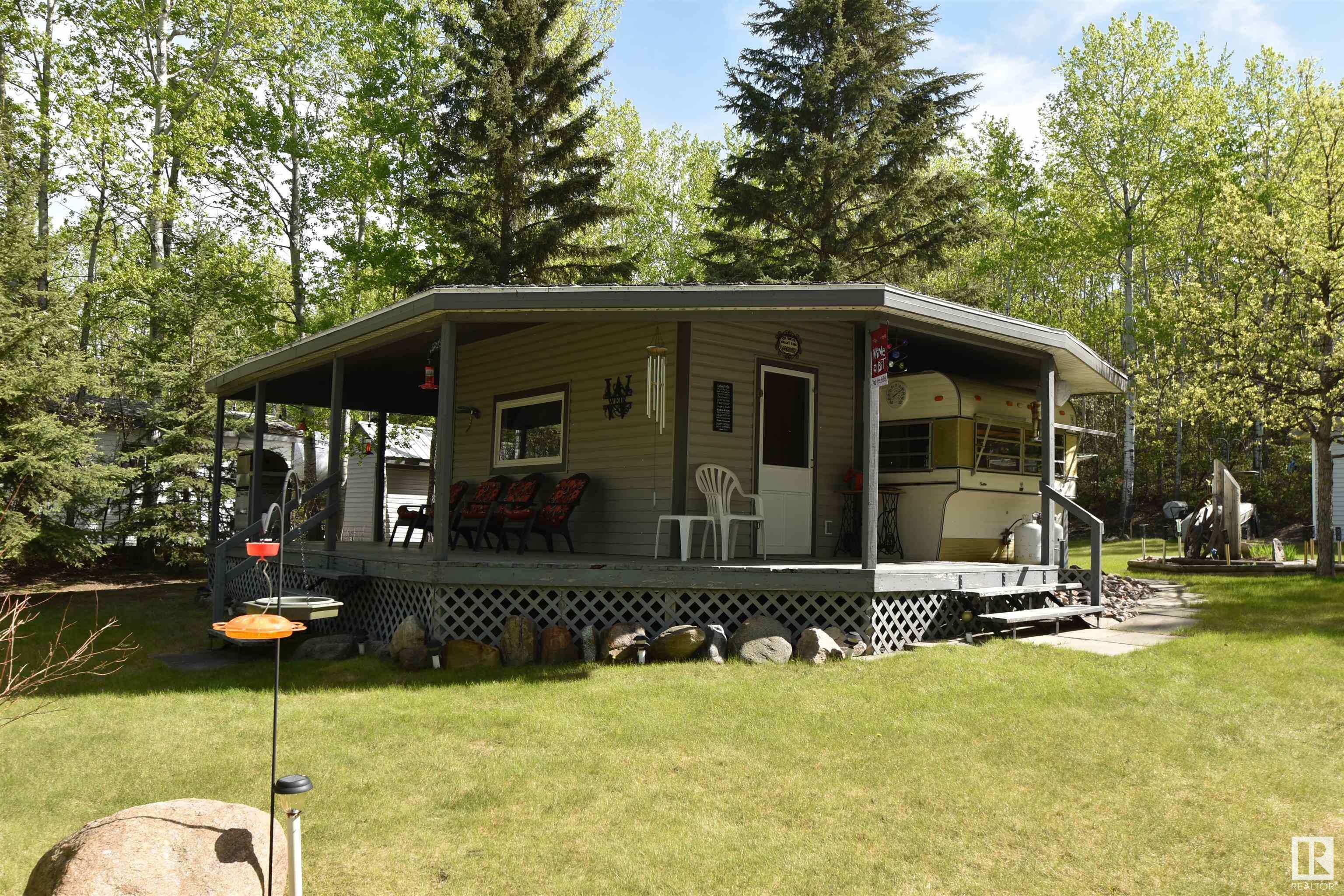 Property Photo: 228, 58532 Rng Rd 113 AB T0A 2Y0