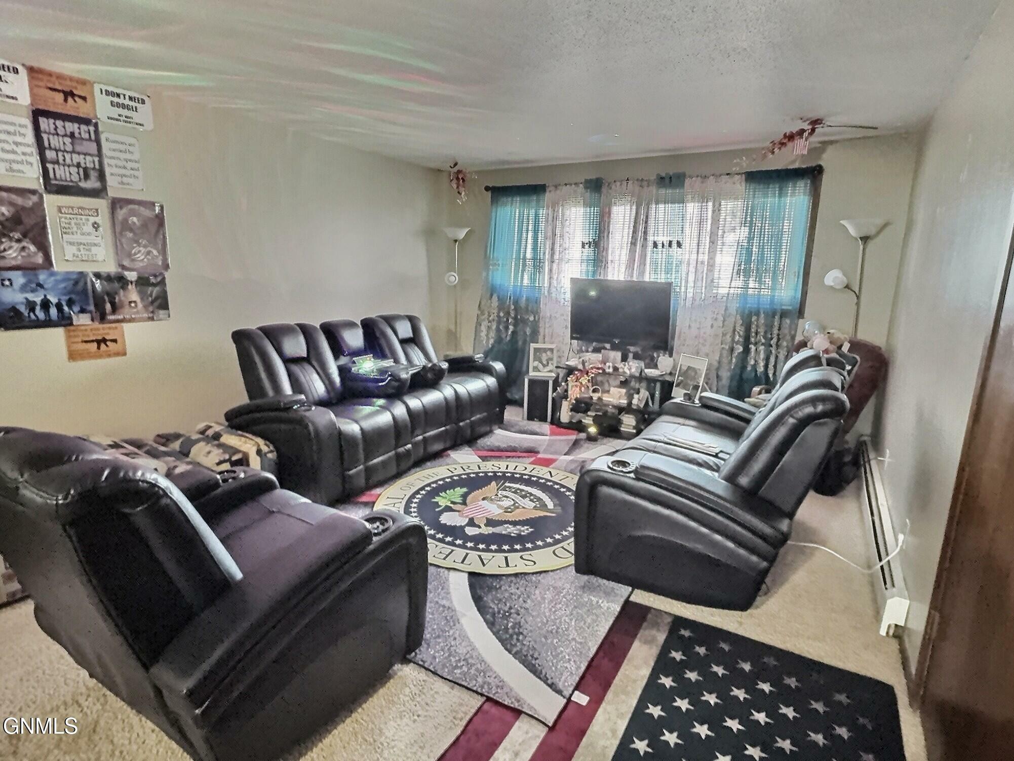 Property Photo: 918 Owens Avenue E 11 ND 58501