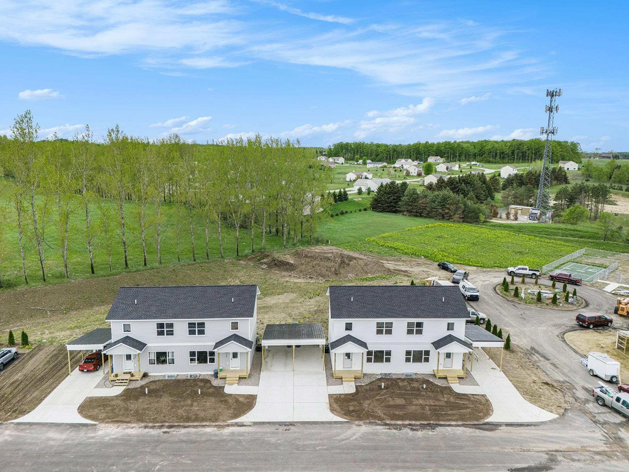 Property Photo:  188 Thrive Boulevard 16  MI 49696 