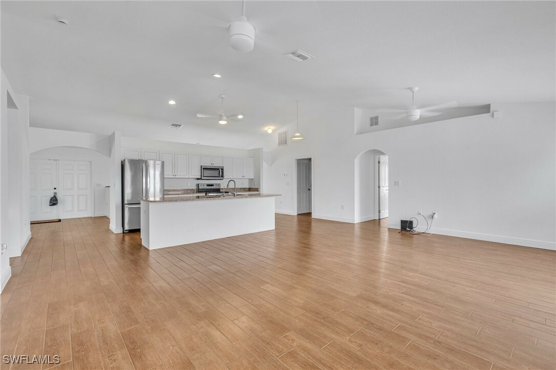 Property Photo: 208 SW 24th Place FL 33991