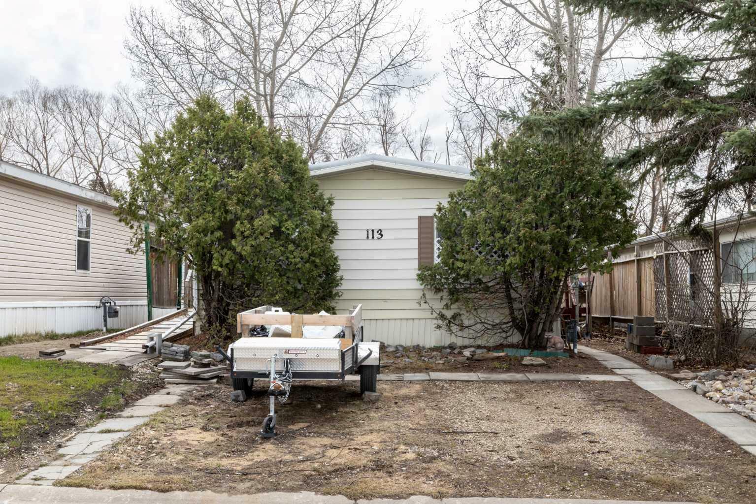 Property Photo: 113 Westwood Court AB T4G 1S2
