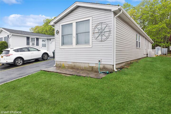 Property Photo: 87 Village Circle W NY 11949