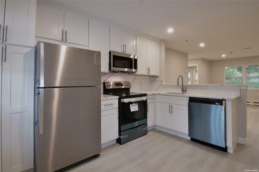 Property Photo: 332 C Woodbridge Drive Woodbridge Dr NY 11961