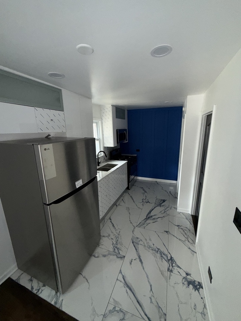 Property Photo: 8819 S Escanaba Avenue Coach IL 60617