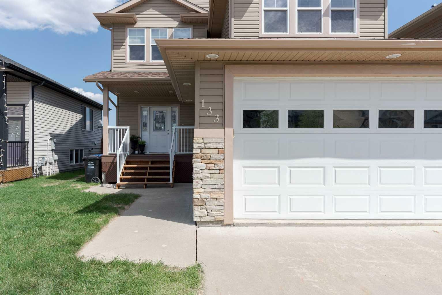 Property Photo: 133 Chestnut Way AB T9K 0M6