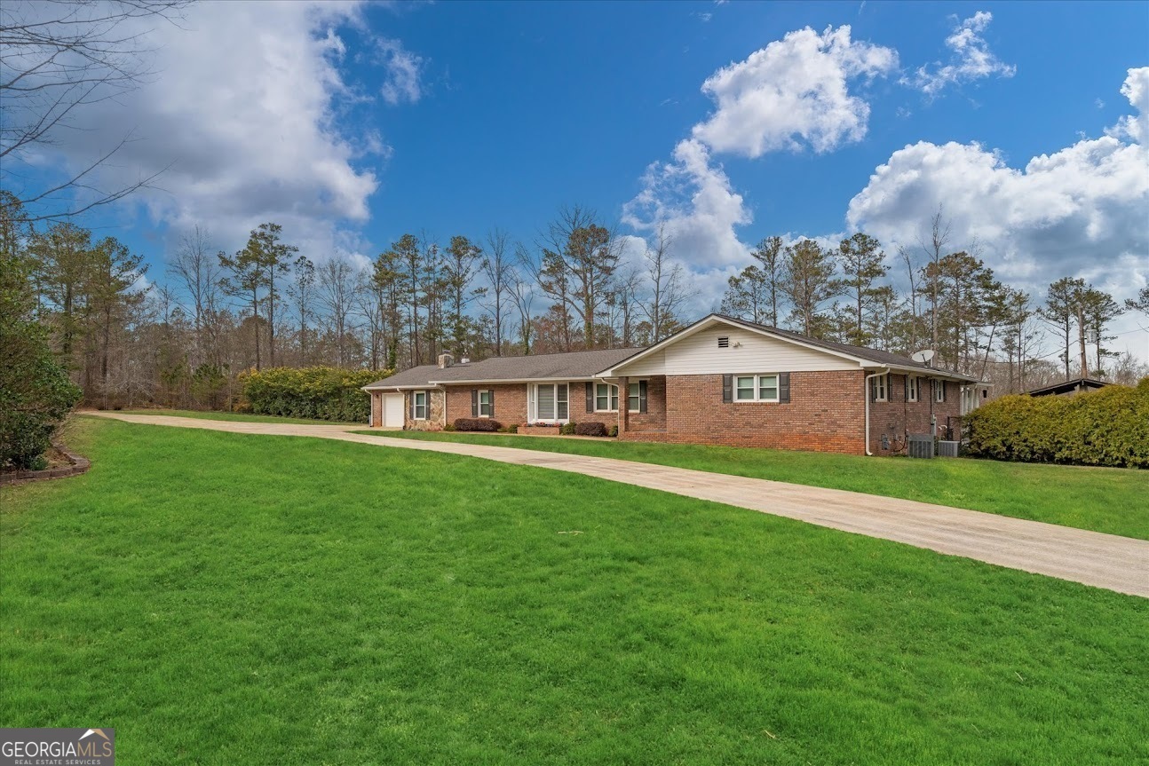 Property Photo:  2716 Georgia 16  GA 30116 