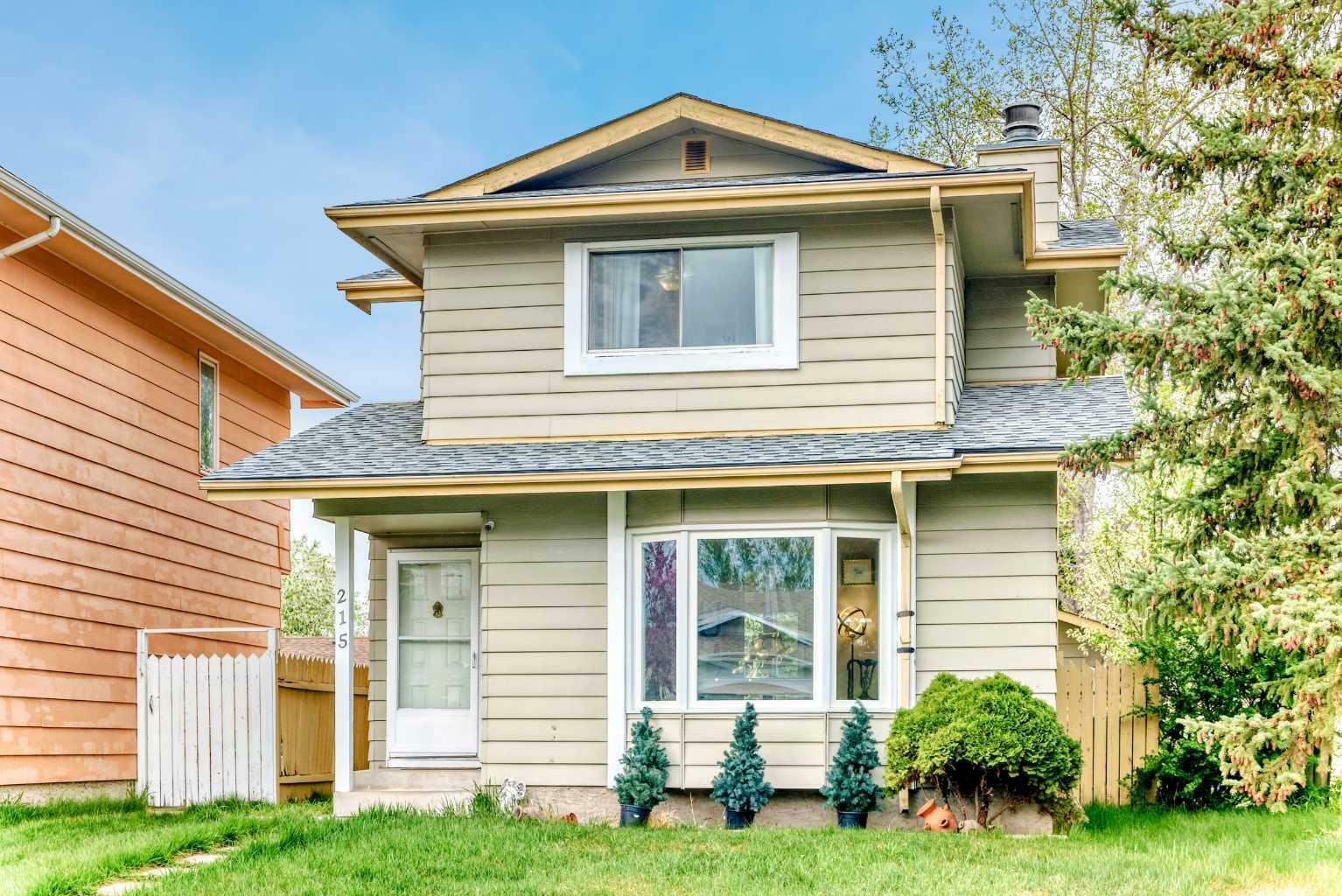 Property Photo: 215 Sunvale Crescent SE AB T2X 2P8