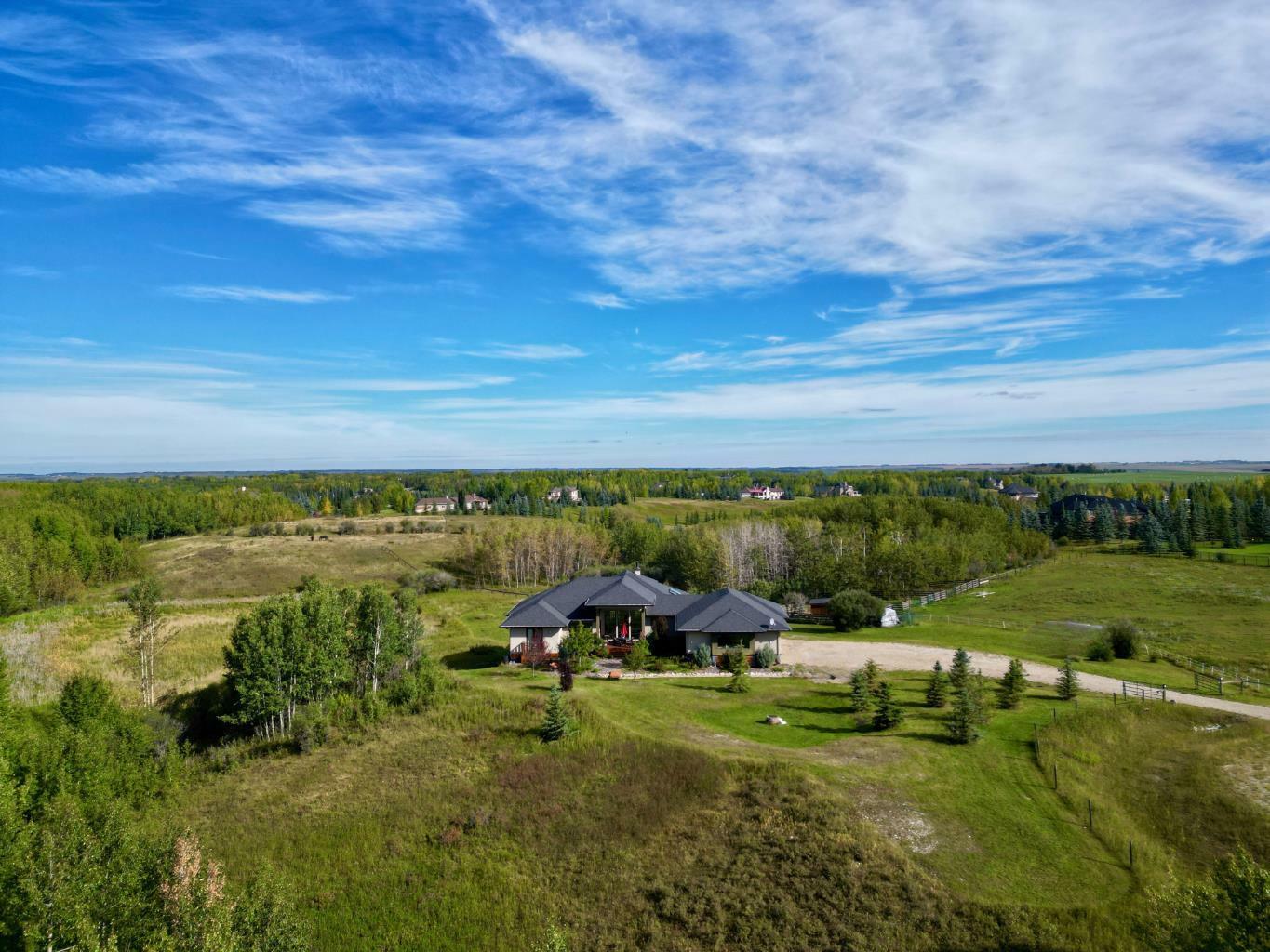 Property Photo: 30124 Bunny Hollow Drive AB T3R 1H6