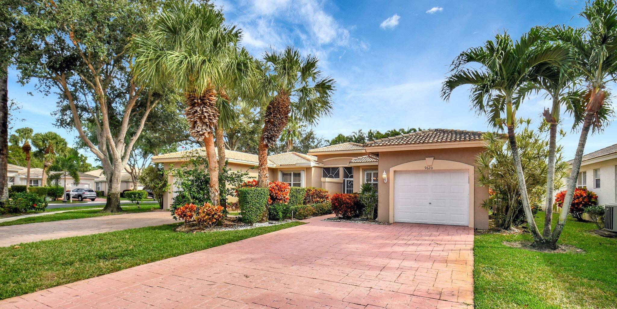 Property Photo: 9620 Crescent View Drive N FL 33437