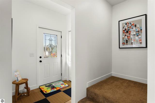 Property Photo:  210 Thrive Boulevard  MI 49696 