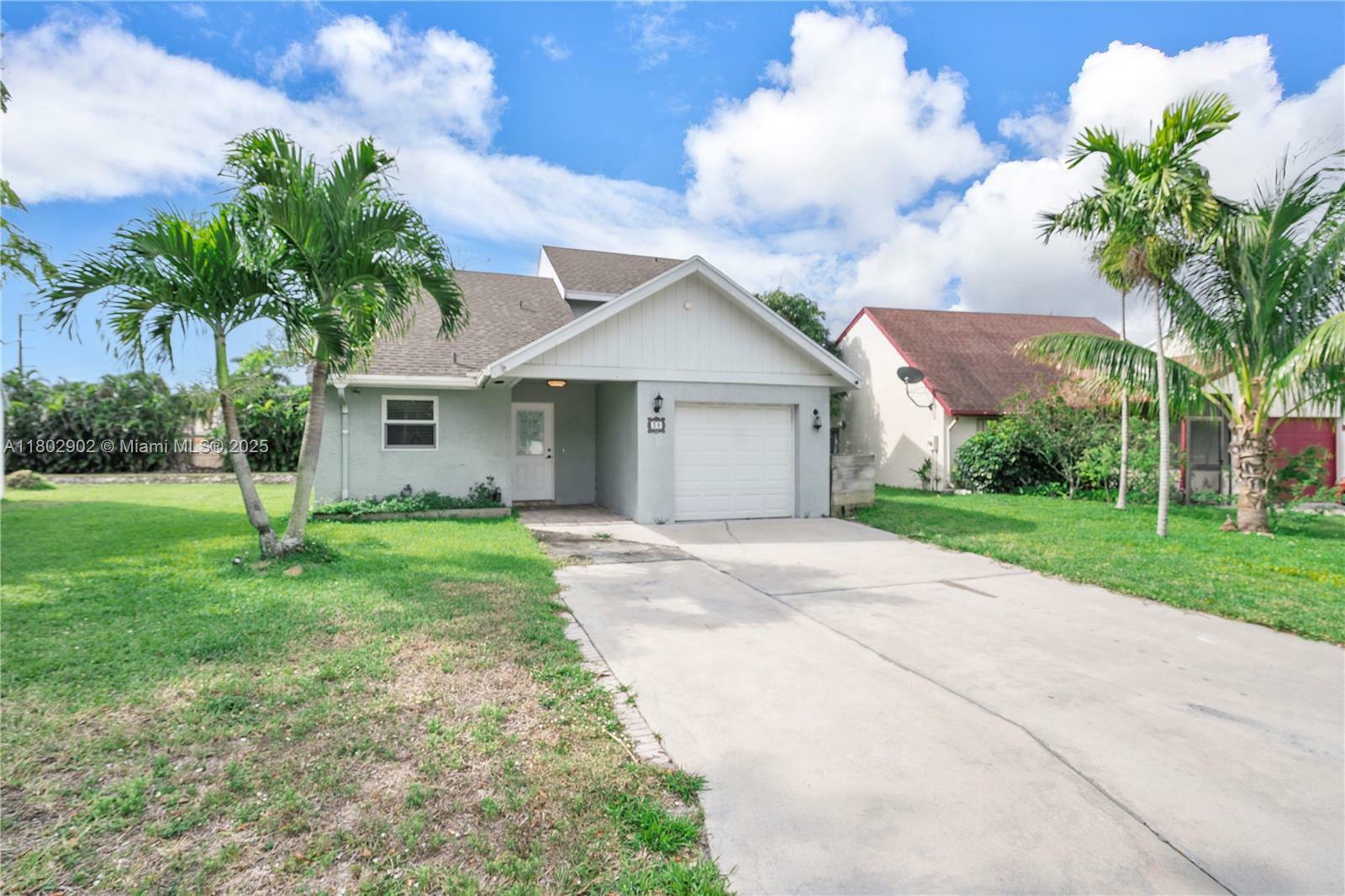 Property Photo: 38 E Tara Lakes Dr E FL 33436