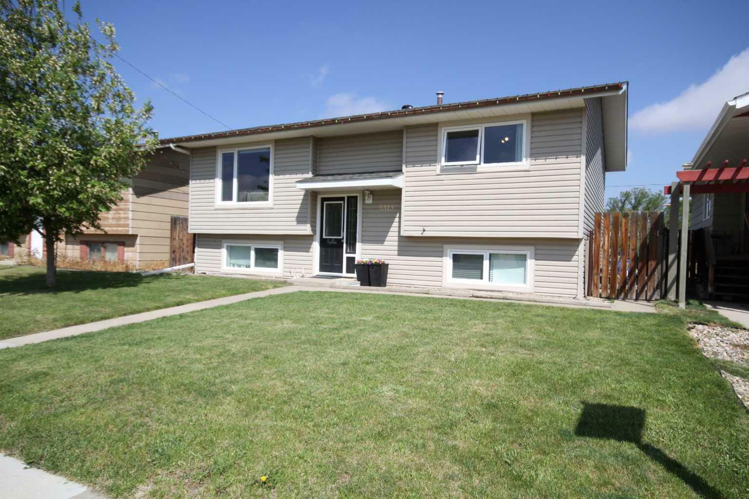 Property Photo: 5313 39 Avenue AB T1G 1C6