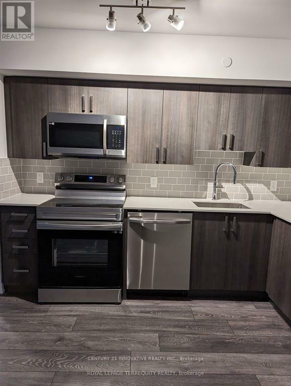 Property Photo: 1455 Celebration Drive 511 ON L1W 0C3