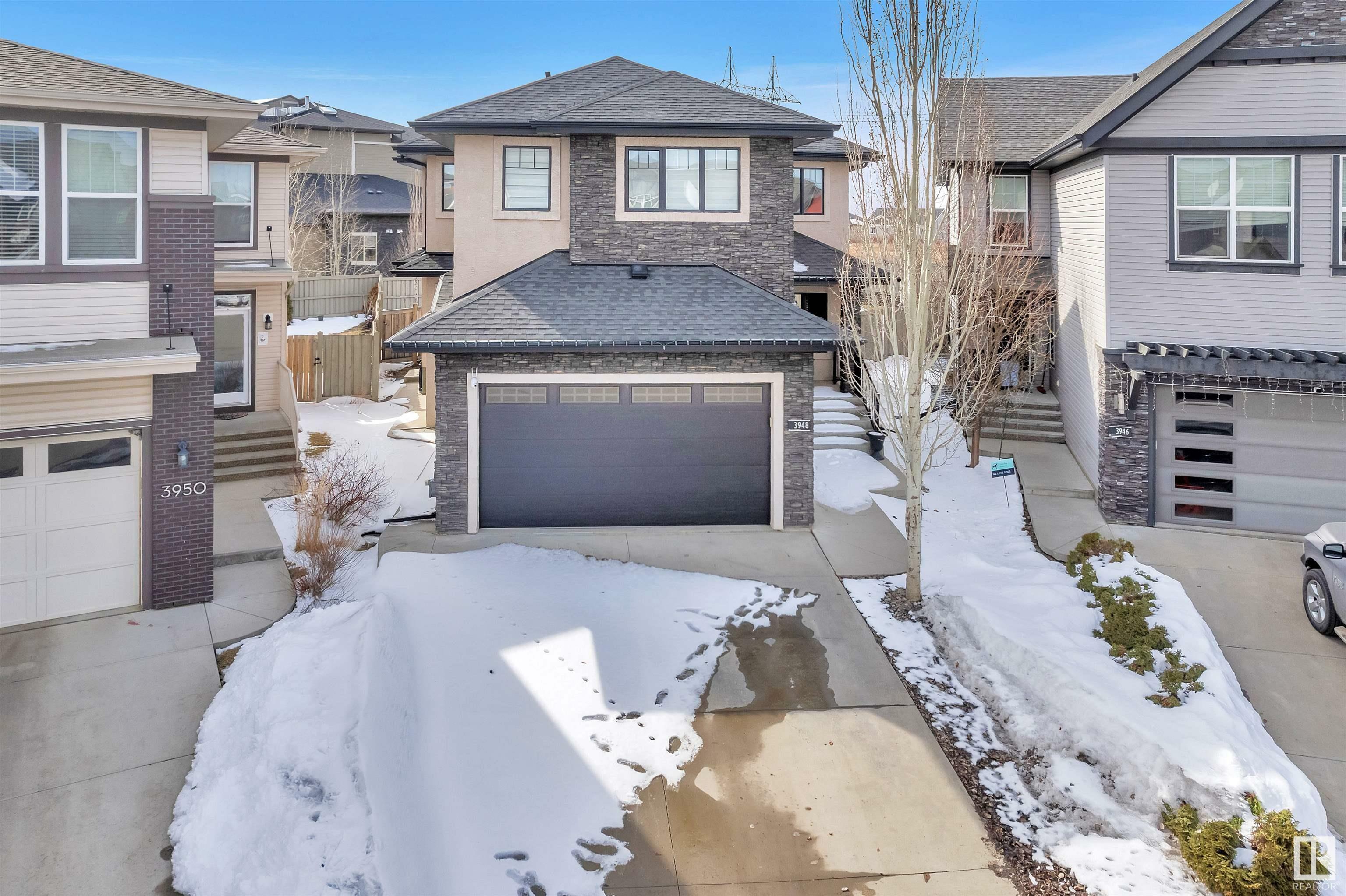 Property Photo: 3948 Claxton Loop SW AB T6W 1Y7