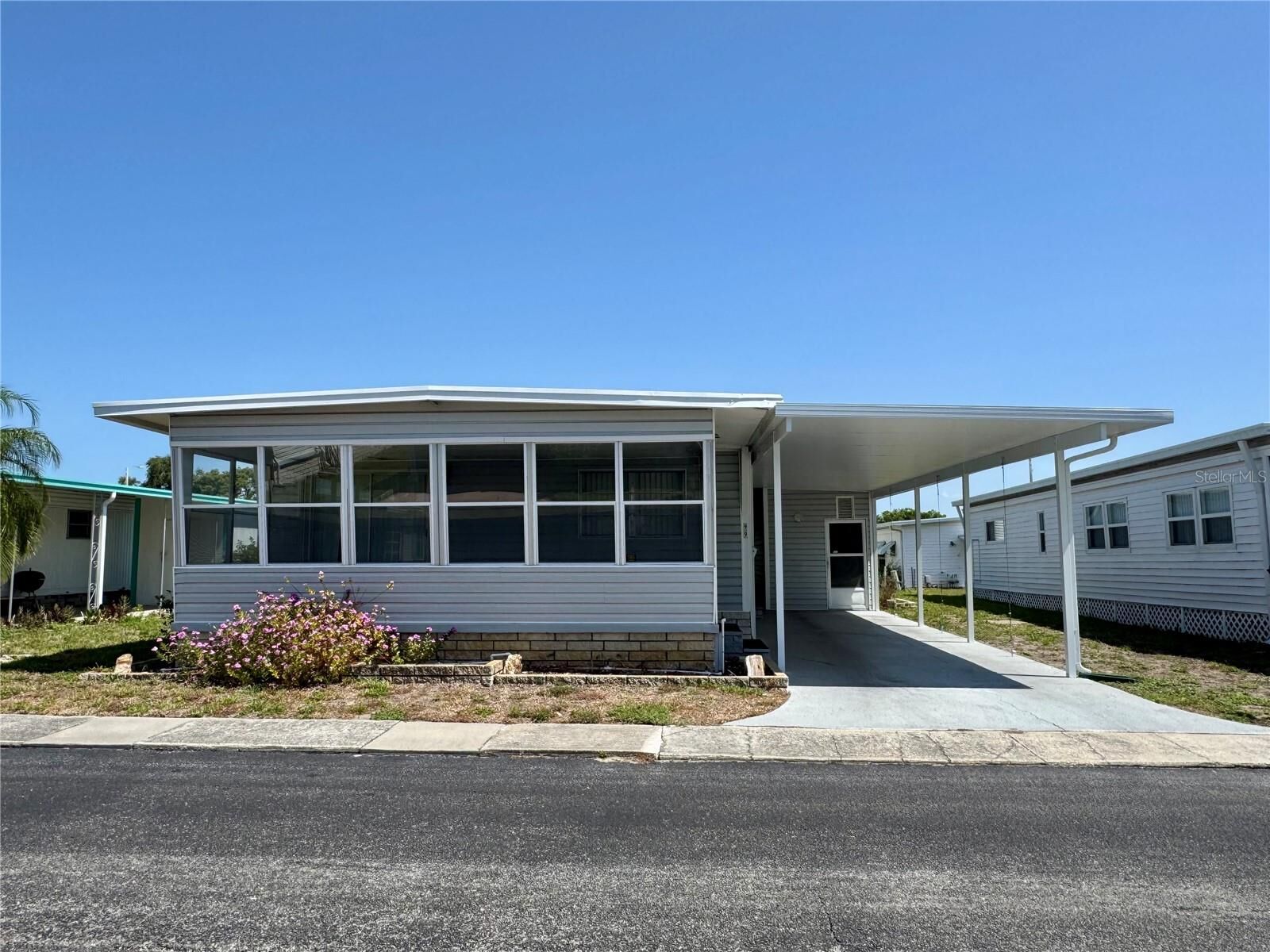 Property Photo:  99 Pindo Palm Street E  FL 33770 
