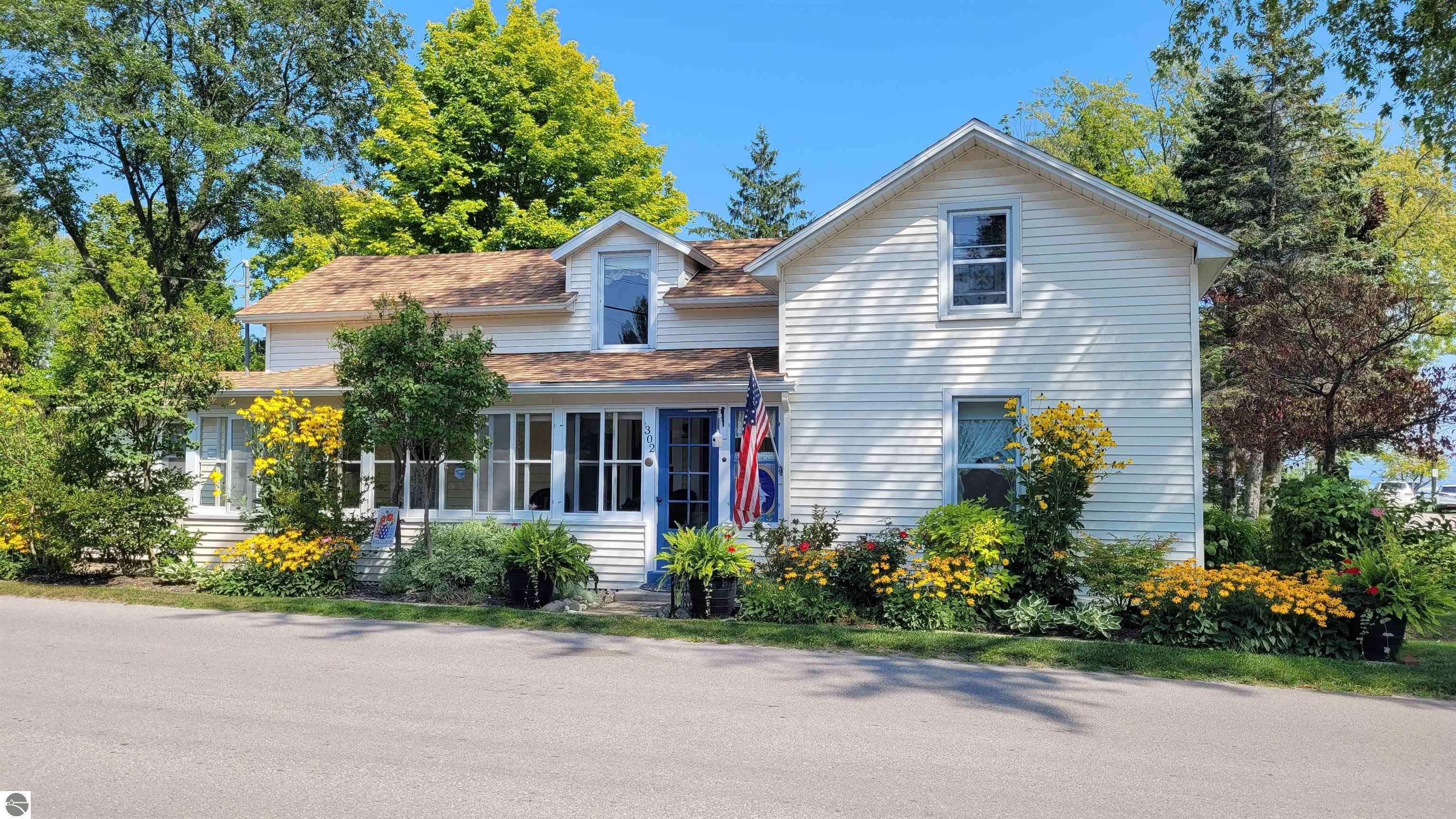 Property Photo:  302 N Rose Street  MI 49670 