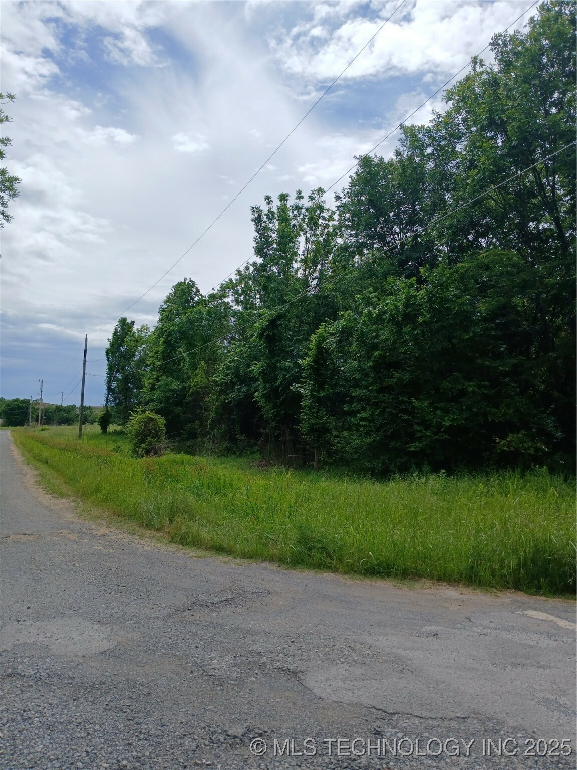 Property Photo:  E Monroe  OK 74522 