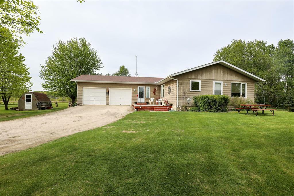 Property Photo: 38085 36 Road North MB R5G 1P8