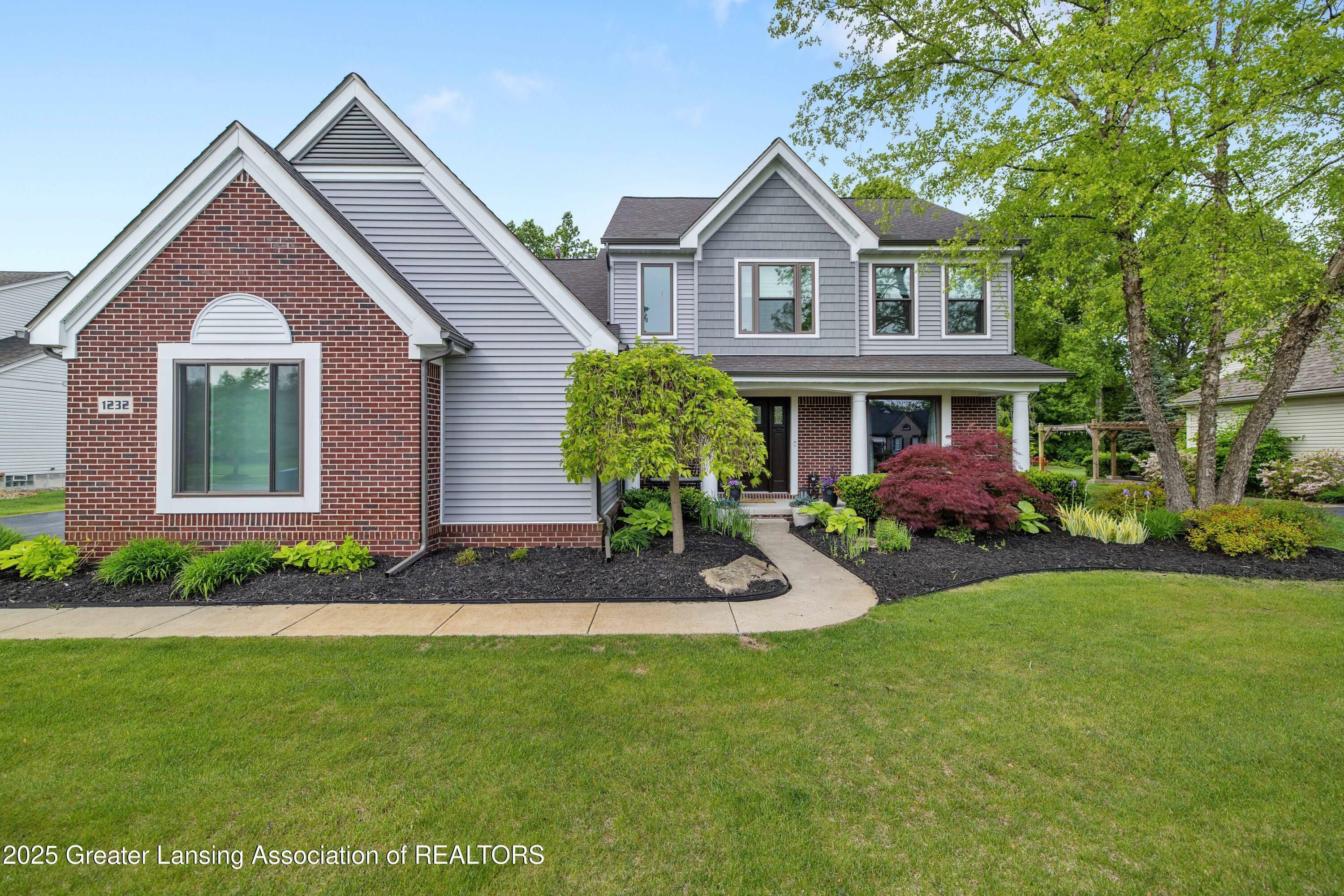 Property Photo: 1232 Chemung Forest Drive MI 48843