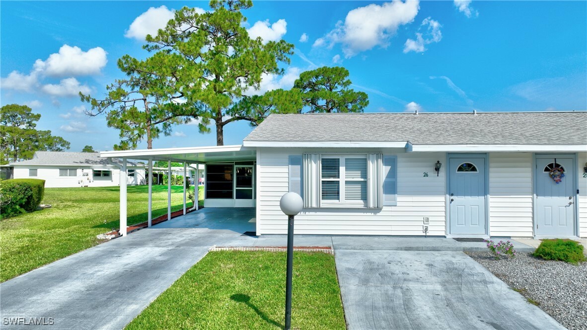 Property Photo: 26 Pinewood Boulevard FL 33936