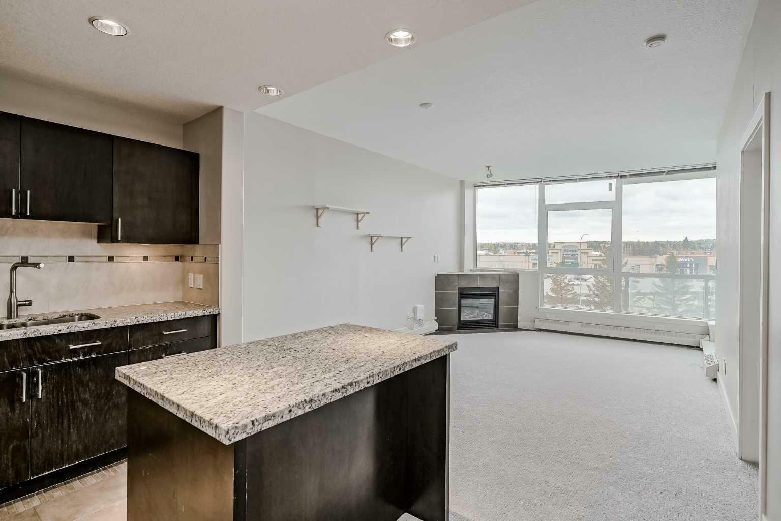 Property Photo:  77 Spruce Place SW 405  AB T3C 3X6 