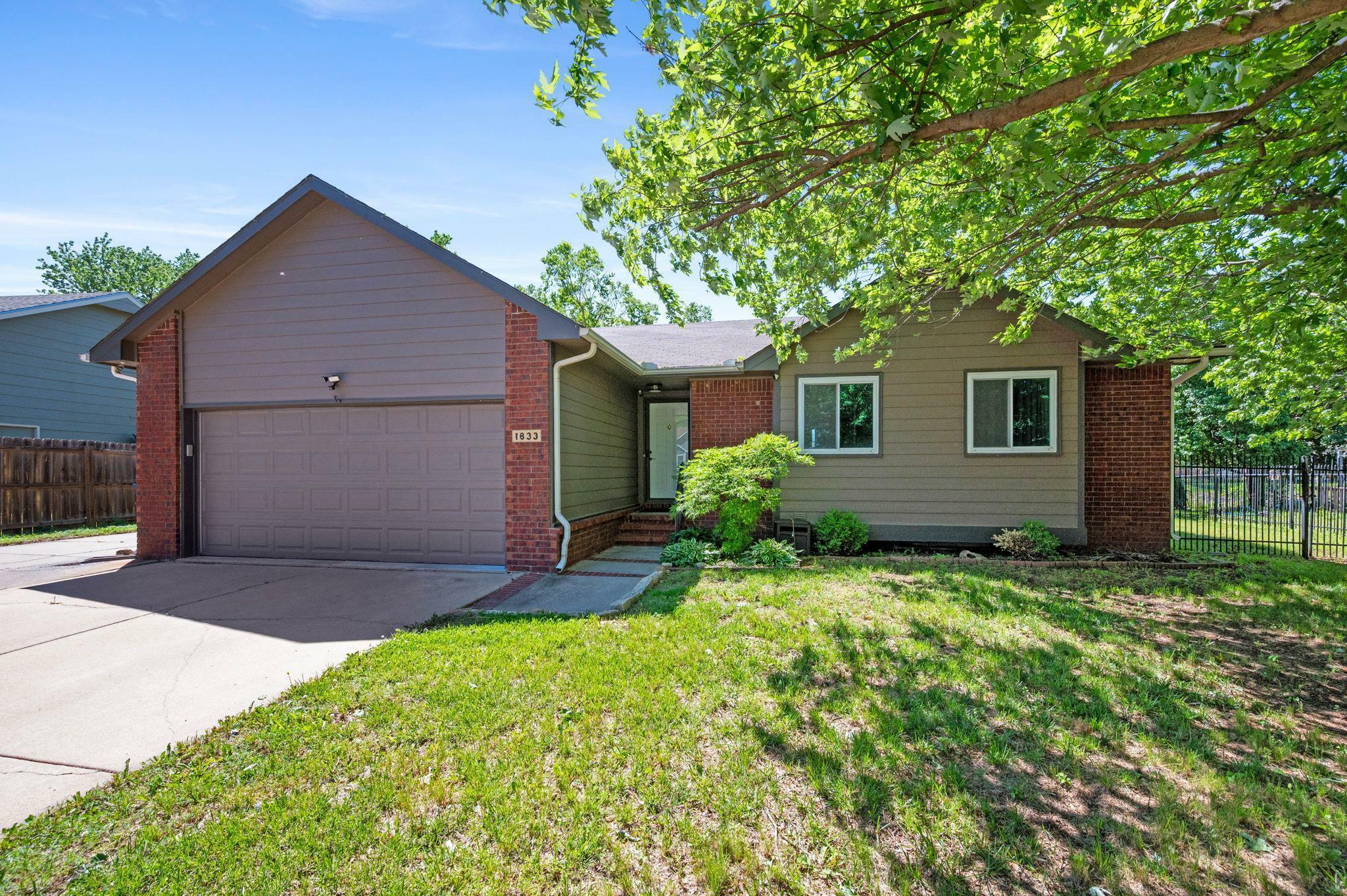 Property Photo: 1833 N Shefford Cir KS 67212