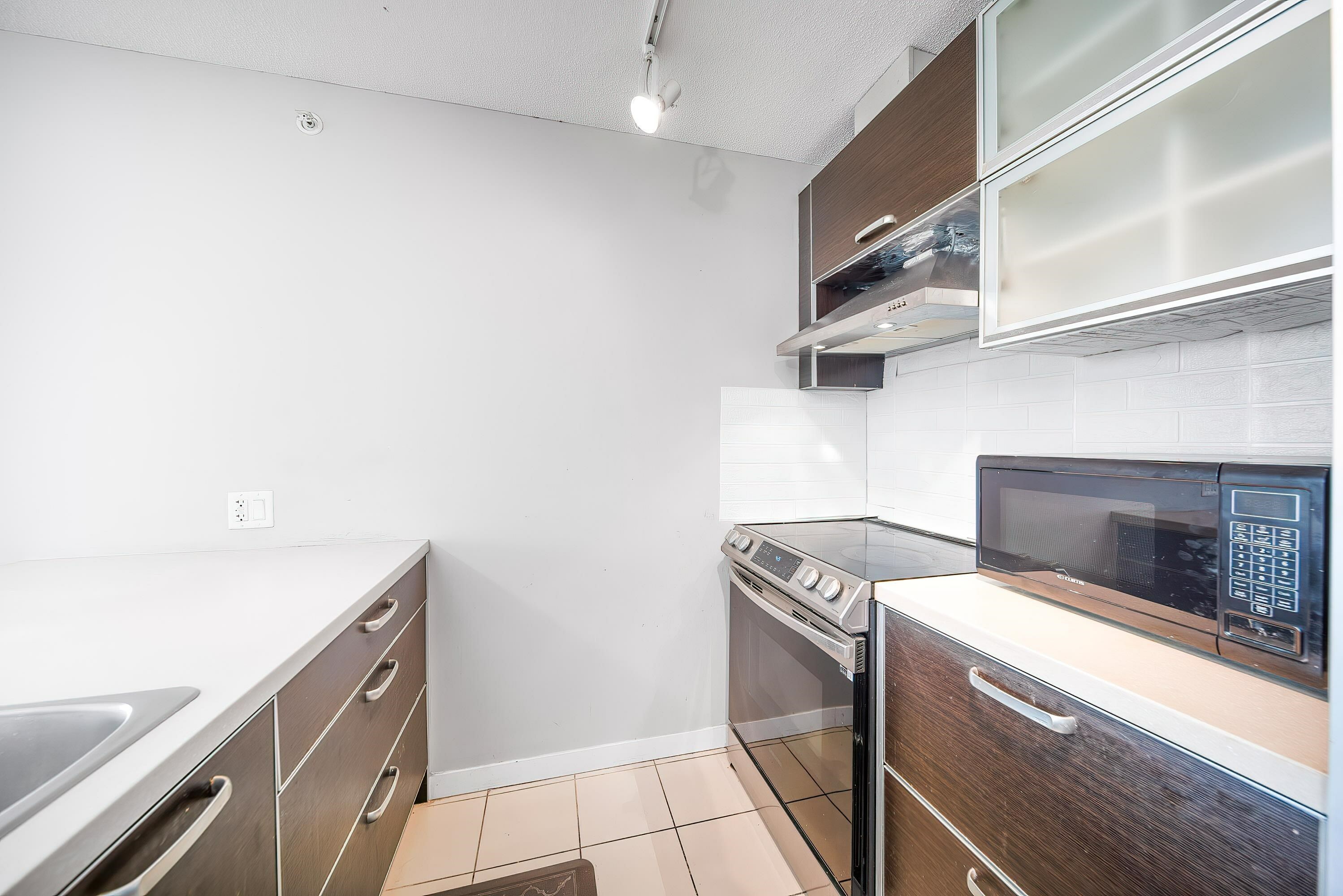 Property Photo:  13688 100 Avenue 504  BC V3T 0G5 