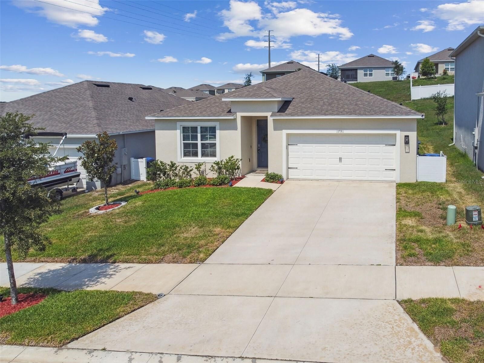 Property Photo:  1791 Hackberry Street  FL 34715 