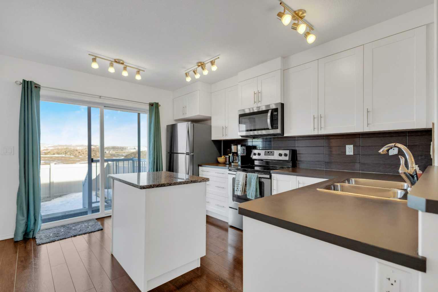 Property Photo: 339 Viscount Drive 402 AB T4R 0S2
