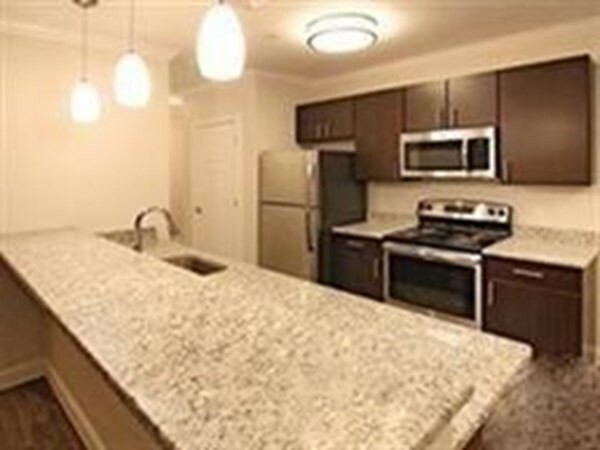Property Photo: 244 Washington Street 1-105 MA 02356