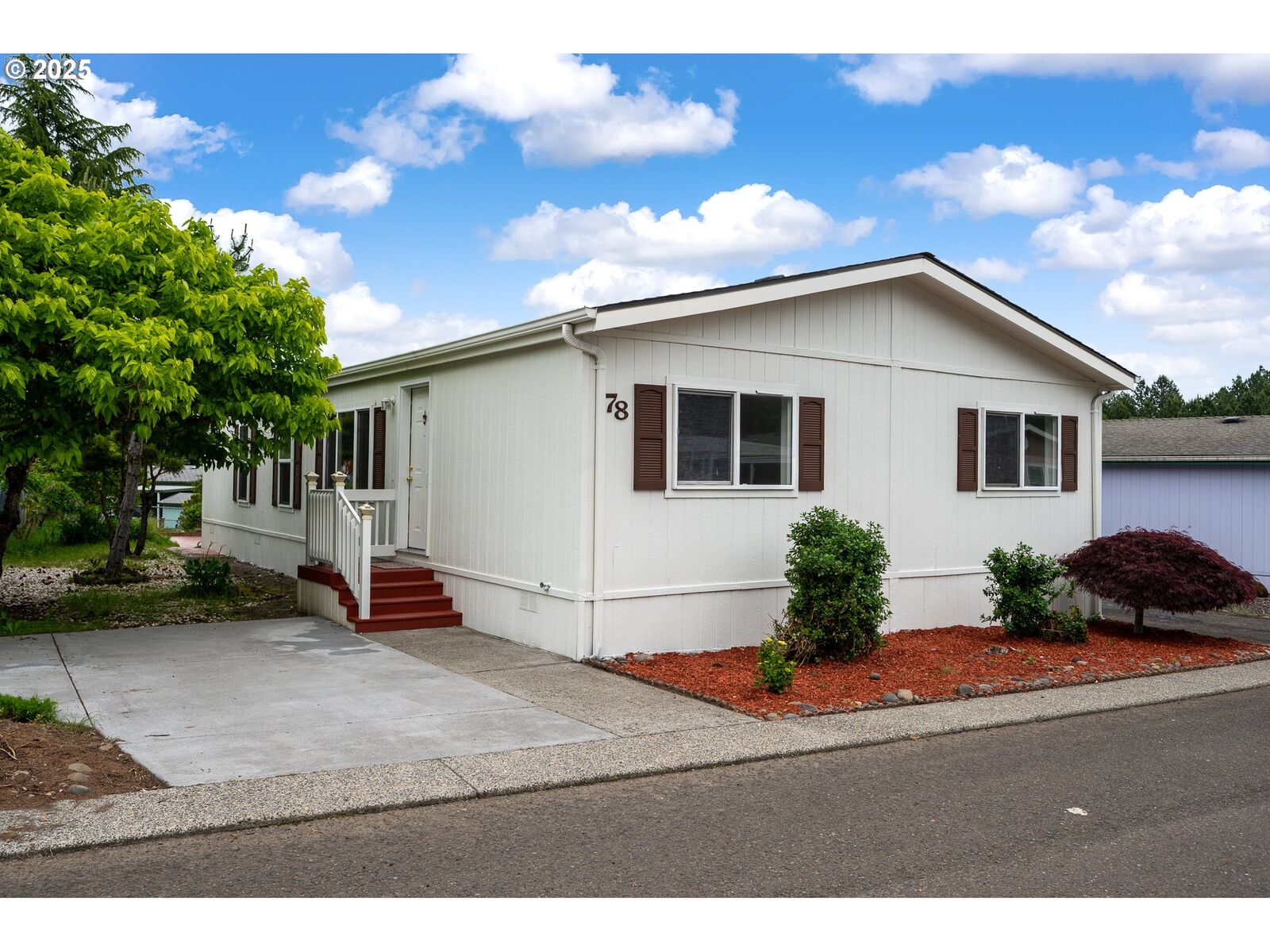 Property Photo:  10400 SE Cook Ct 78  OR 97222 