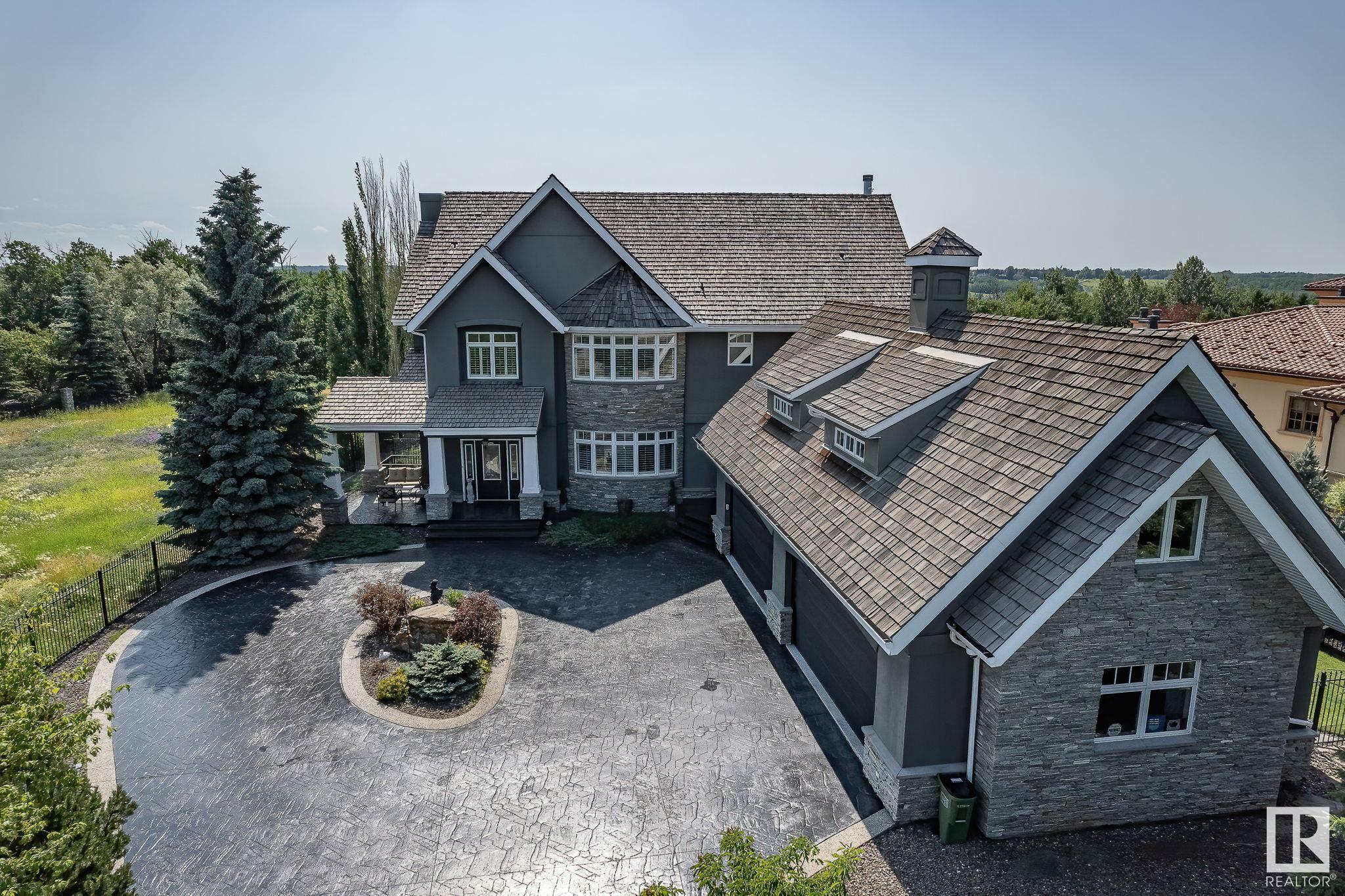 Property Photo: 60 Windermere Drive SW AB T6W 0S1
