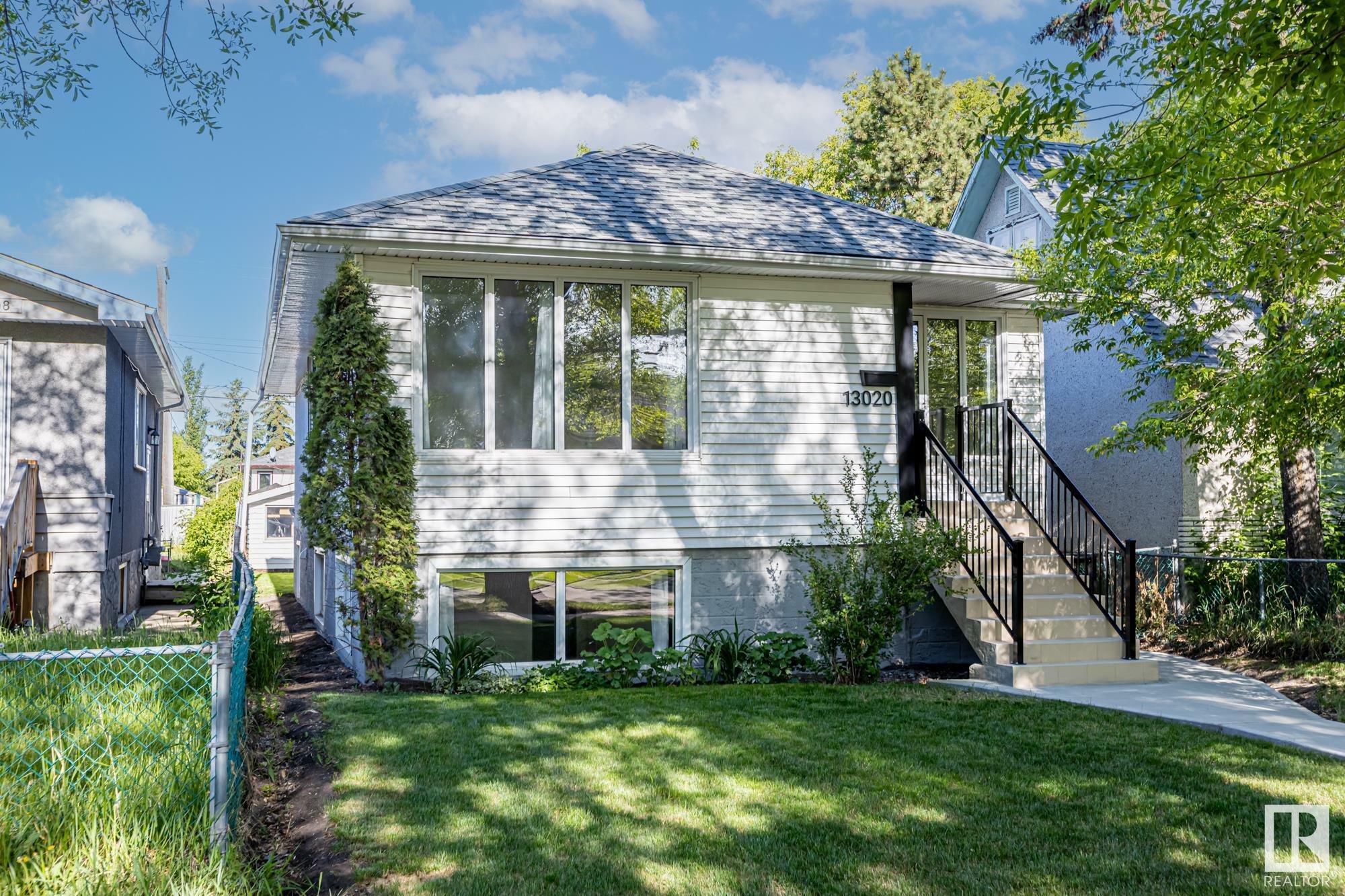 Property Photo: 13020 65 Street NW AB T5A 1A1