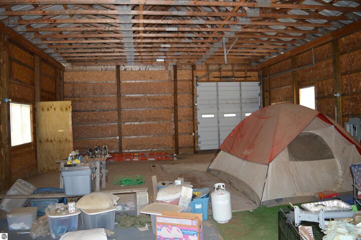 Property Photo:  8627 NE Country Road  MI 49659 