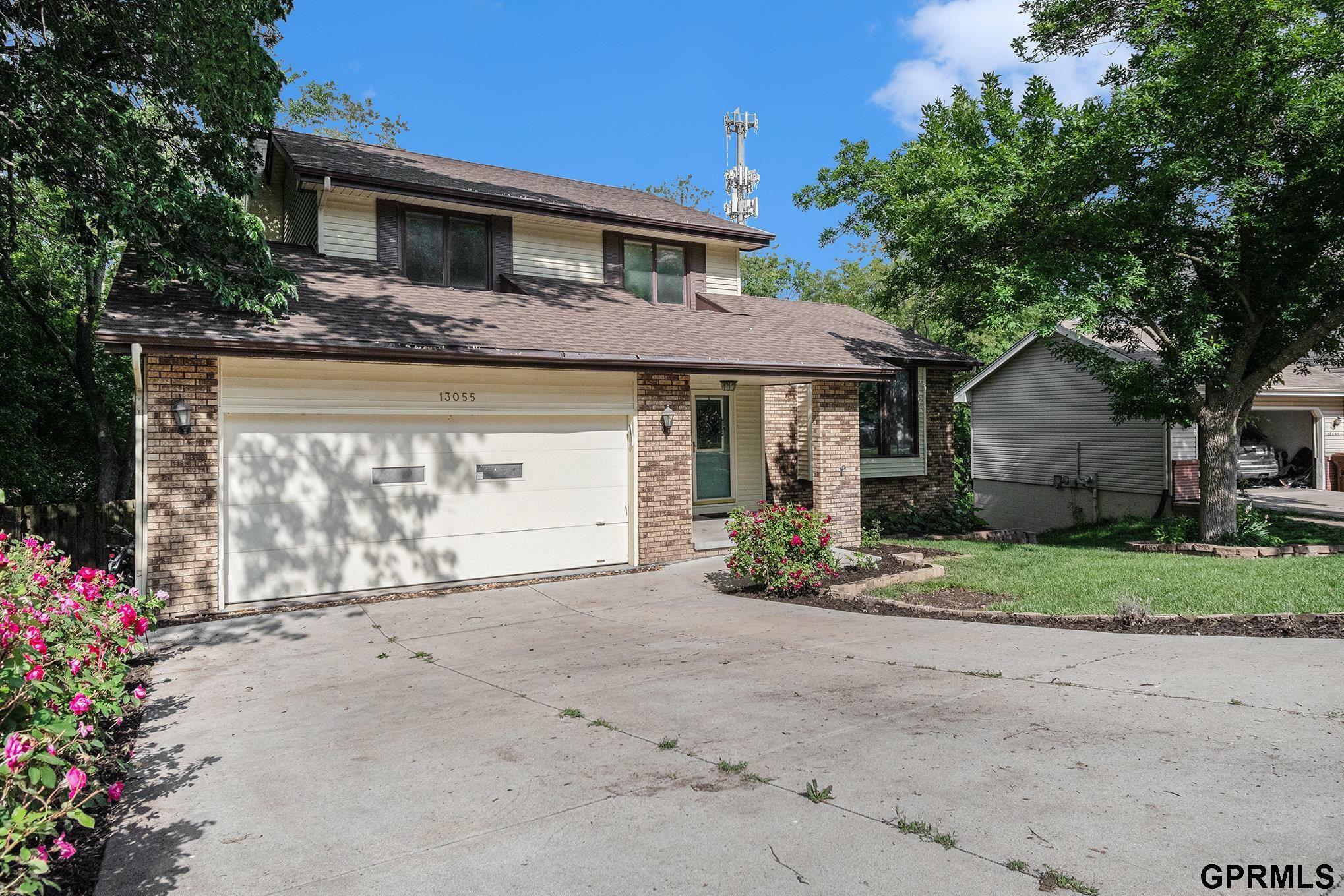 Property Photo: 13055 Brookside Drive NE 68123