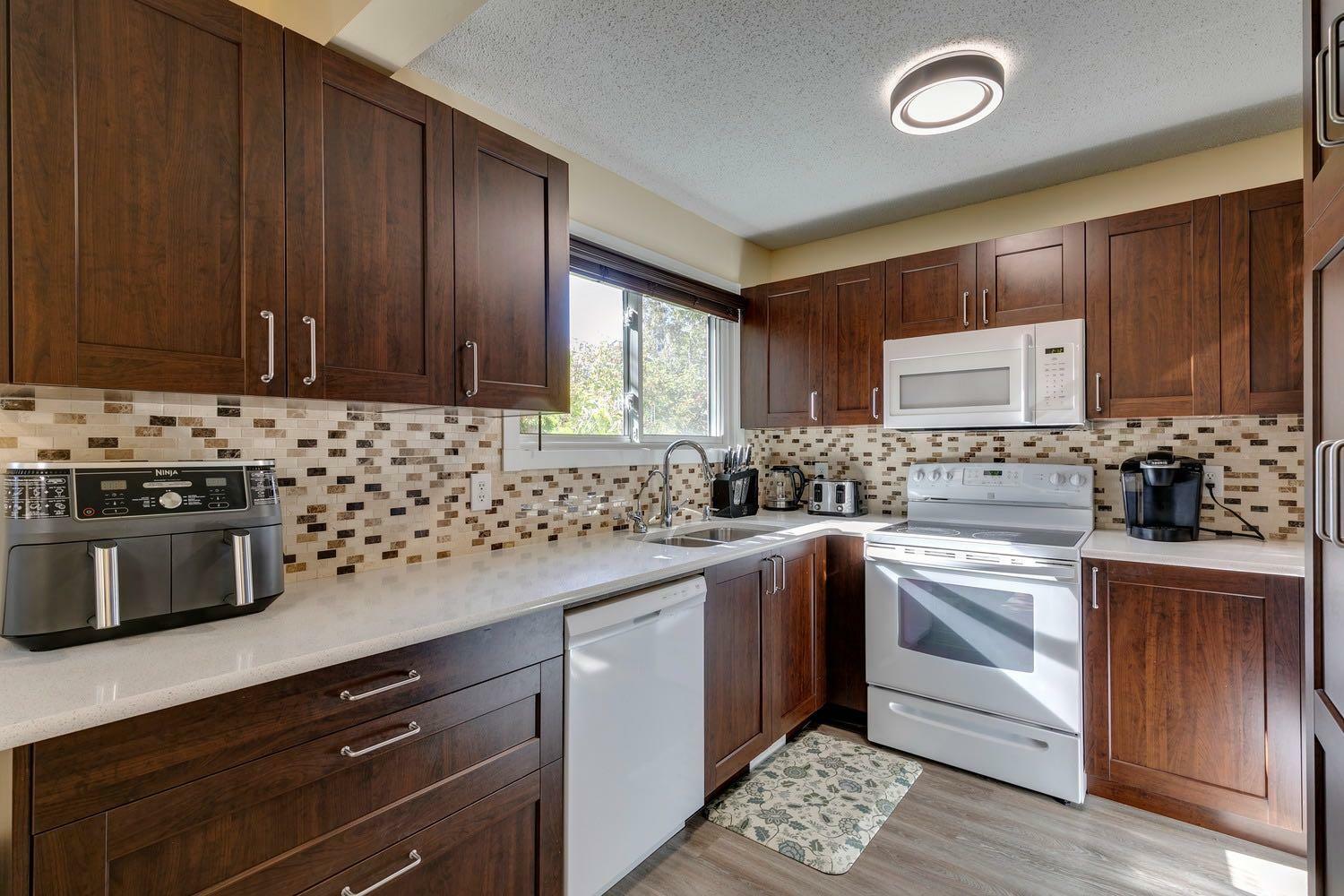 Property Photo: 6915 Ranchview Drive NW 61 AB T3G 1R8