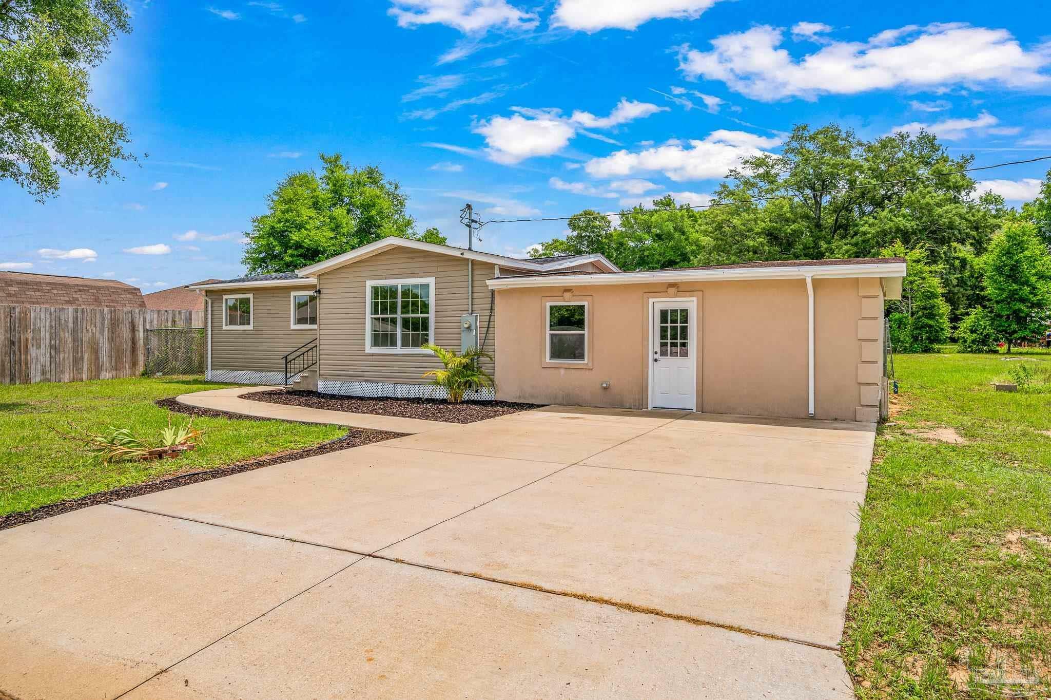Property Photo: 6998 Cosmos St FL 32570