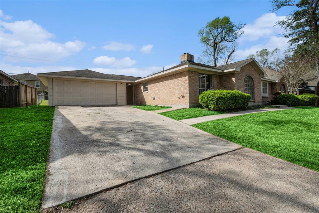 Property Photo: 10056 Woodhollow Drive TX 77385