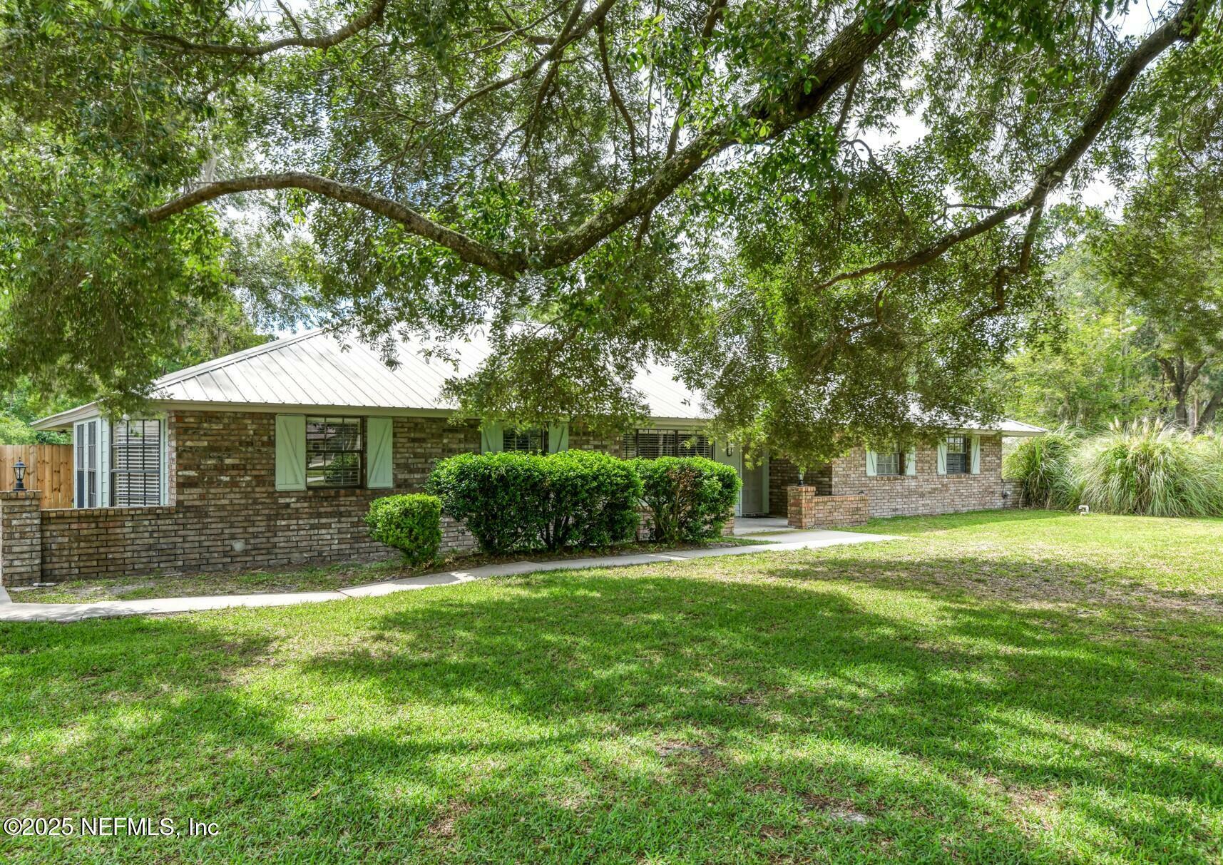 Property Photo:  122 Raintree Woods Trail  FL 32177 
