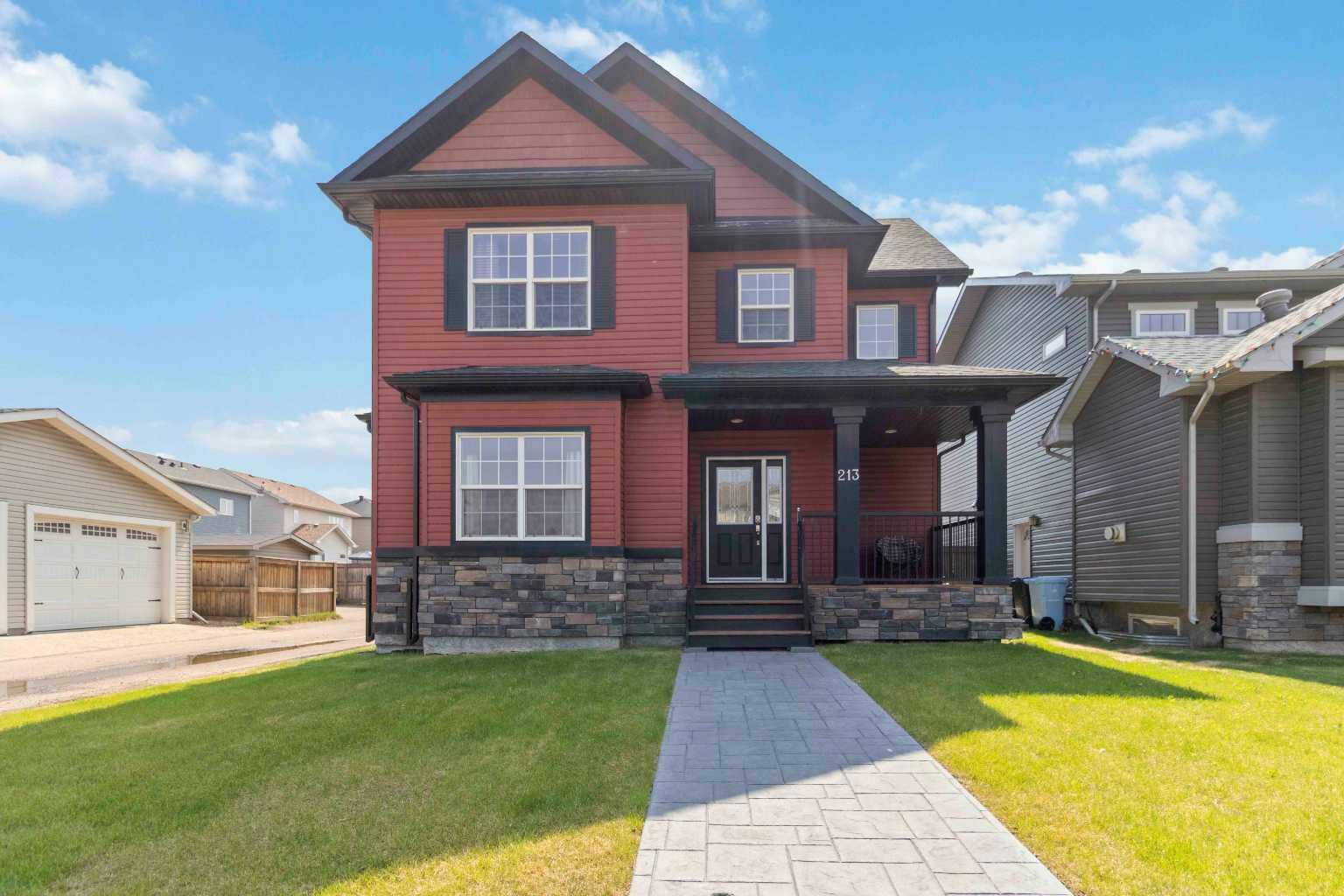 Property Photo: 213 Snowy Owl Way AB T9K 0R8