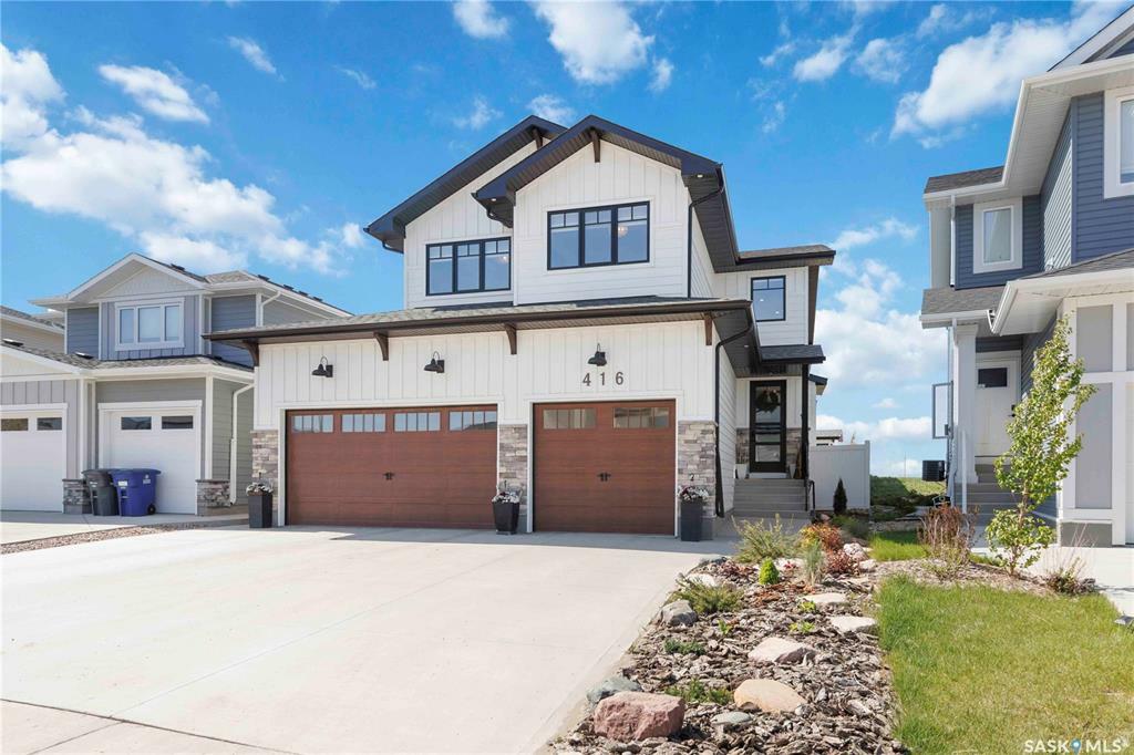 Property Photo: 416 Woolf Bend SK S7W 1E5