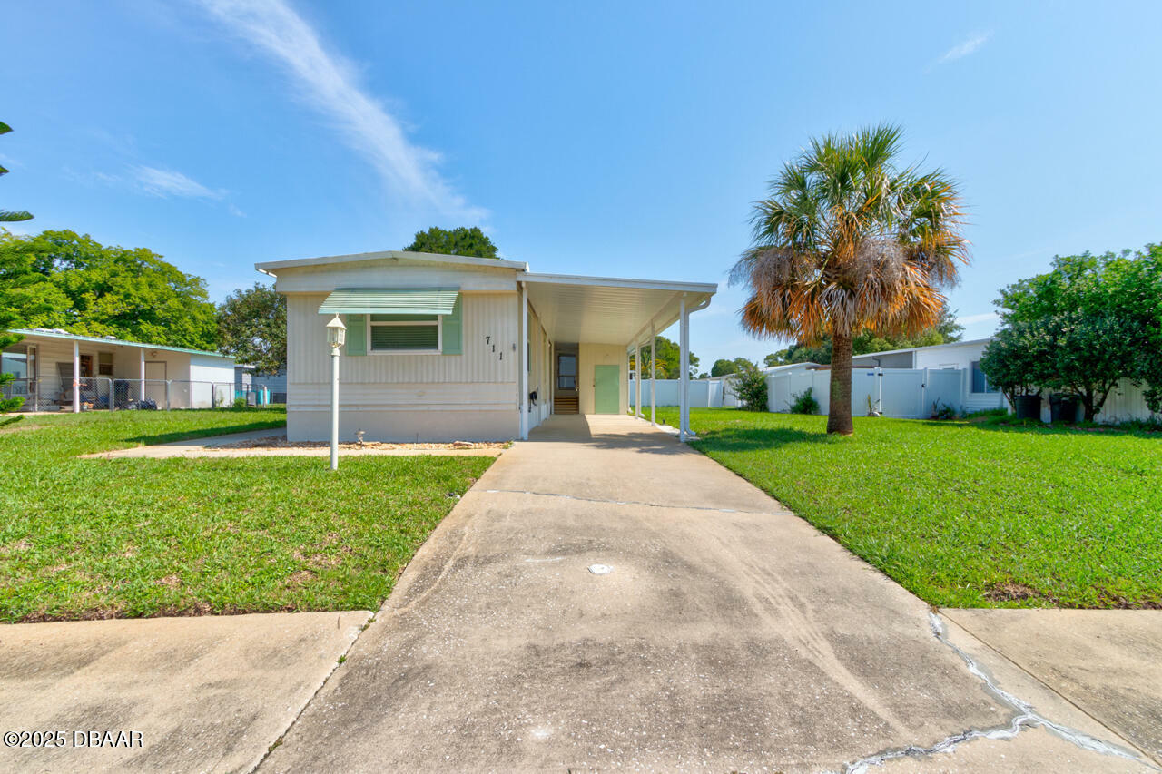 Property Photo: 711 Leward Way FL 32129