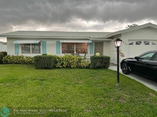 Property Photo:  1213 SW 20th  FL 33426 