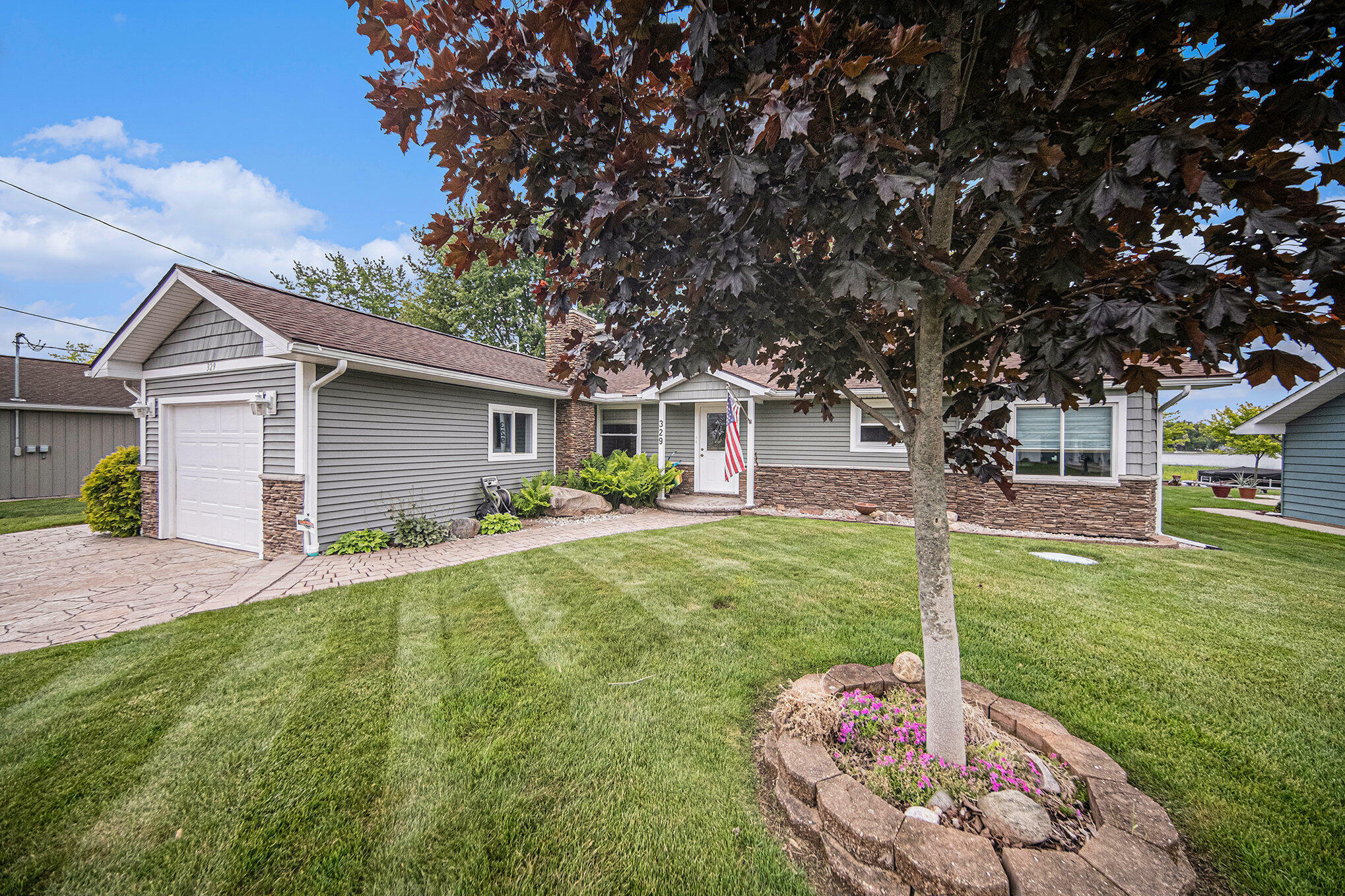 Property Photo:  329 Pamela Circle  MI 49230 