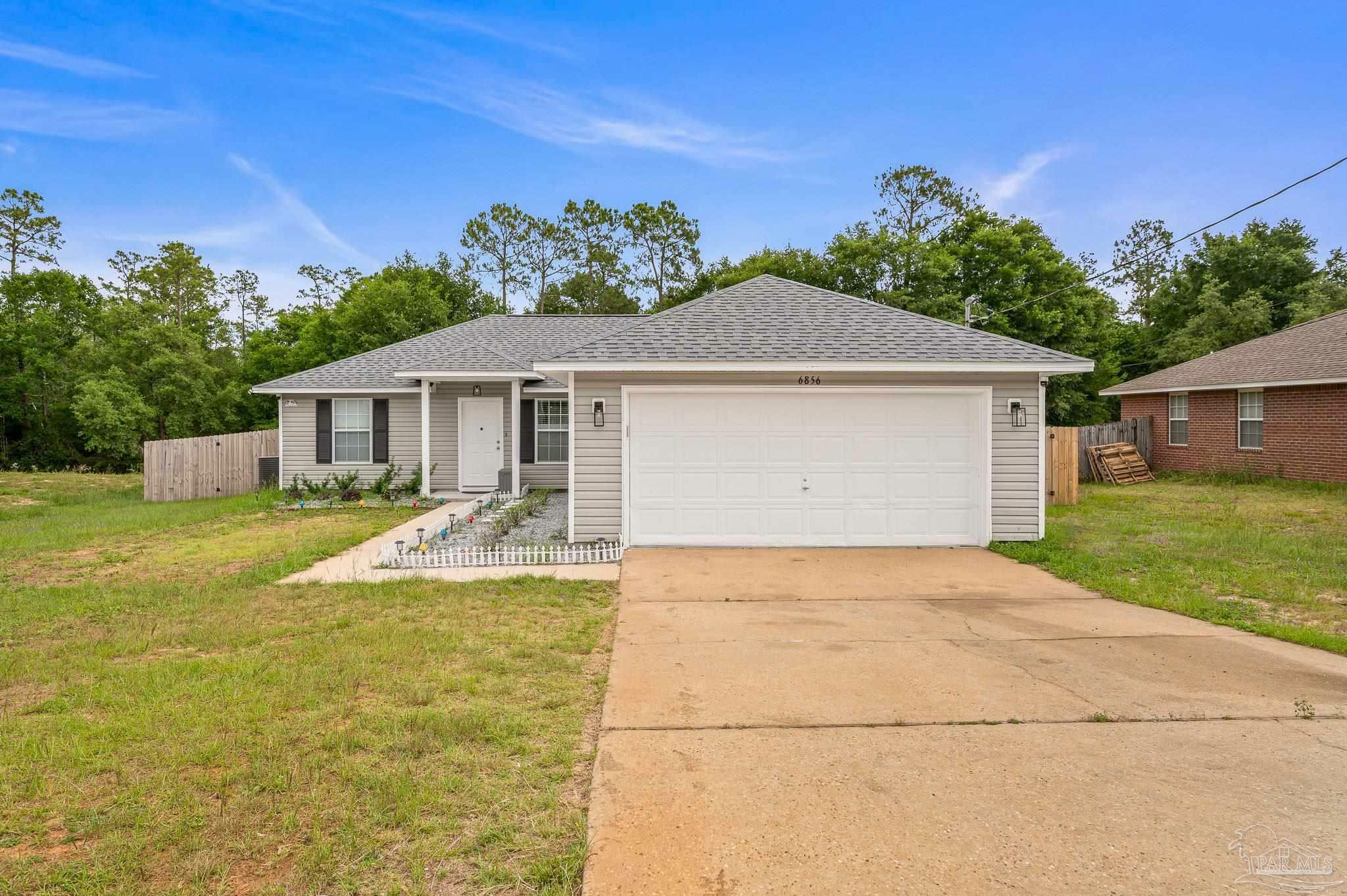 Property Photo: 6856 Old West Ln FL 32570