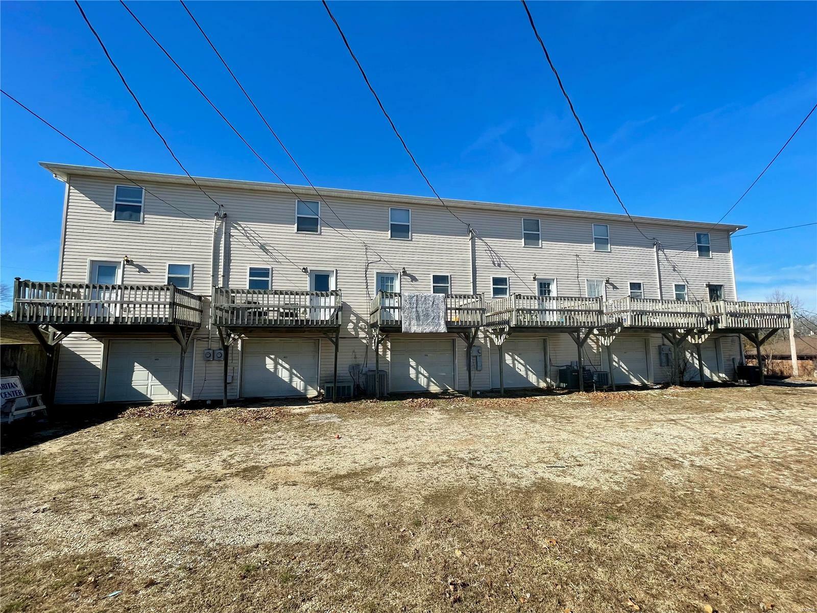 Property Photo:  401 Country Villa  MO 65584 
